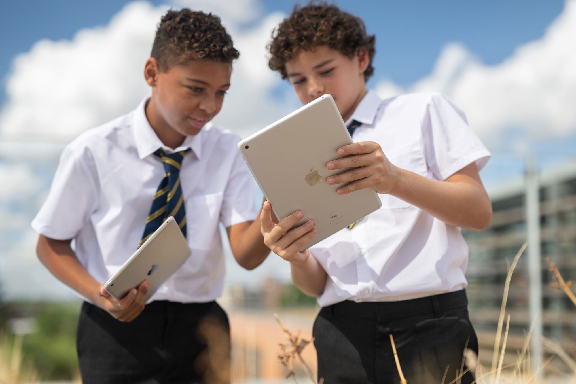 school-boys-using-ipads-outdoors